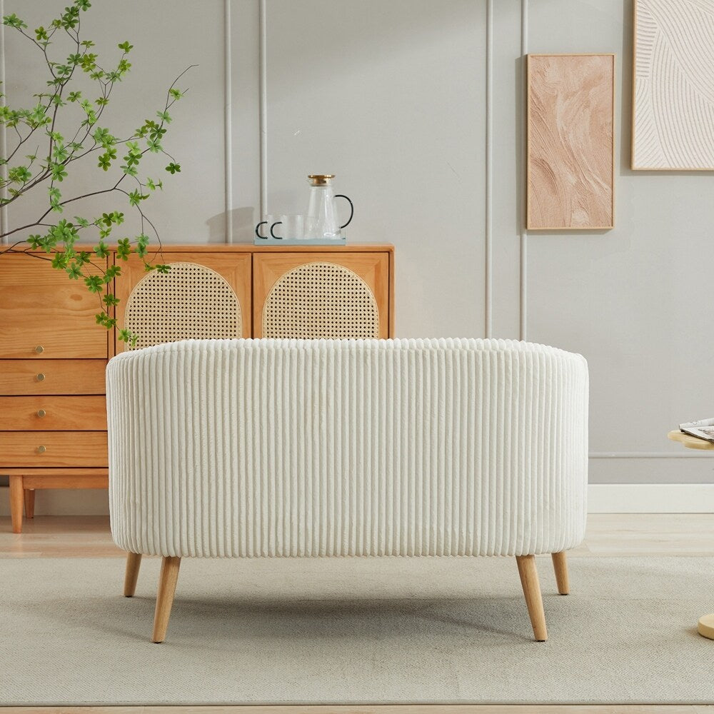 Canapé 2 places recouvert de tissu velours côtelé avec pieds en noyer